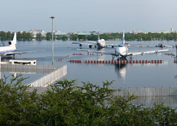 "Flooded Don Mueang Airport in Bangkok, Thailand. Unusual heavy rains in July 2011 combined with high tides of the sea triggered massive flooding in Thailand. Approximately one third of all provinces are affected."