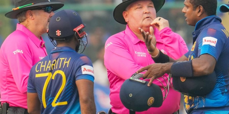 New Delhi: Sri Lankan batters Charith Asalanka and Angelo Mathews talk to umpires as Mathews being given 'timed out' during the ICC Cricket World Cup 2023 match between Sri Lanka and Bangladesh, at the Arun Jaitley Cricket Stadium in New Delhi, Monday, Nov. 6, 2023. (PTI Photo/Kamal Kishore)(PTI11_06_2023_000166A)