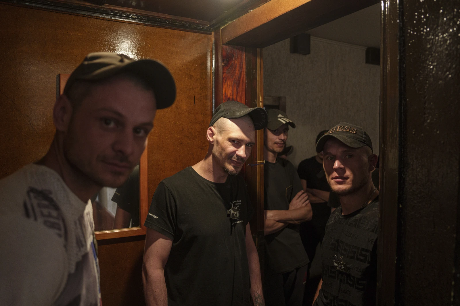 Prisoners stand in line for an interview with representatives of the Ukrainian Armed Forces in a prison, in the Dnipropetrovsk region, Ukraine, Friday, June 21, 2024. 