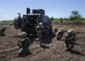 Convict prisoners which join Ukrainian army train at the polygon, in the Dnipropetrovsk region, Ukraine, Saturday, June 22, 2024.