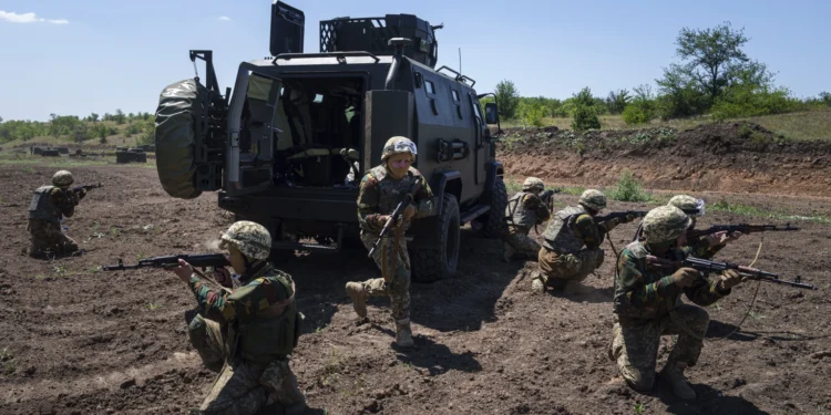 Convict prisoners which join Ukrainian army train at the polygon, in the Dnipropetrovsk region, Ukraine, Saturday, June 22, 2024.