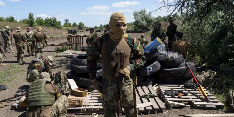 Convict prisoners who have joined the Ukrainian army train at the polygon, in the Dnipropetrovsk region, Ukraine, Saturday, June 22, 2024.