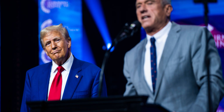 Duluth, GA - October 24 : Robert F. Kennedy Jr. speaks with Republican presidential nominee former President Donald Trump at a Turning Point Action Rally in Duluth, GA on Wednesday, Oct. 23, 2024. (Photo by Jabin Botsford/The Washington Post via Getty Images)