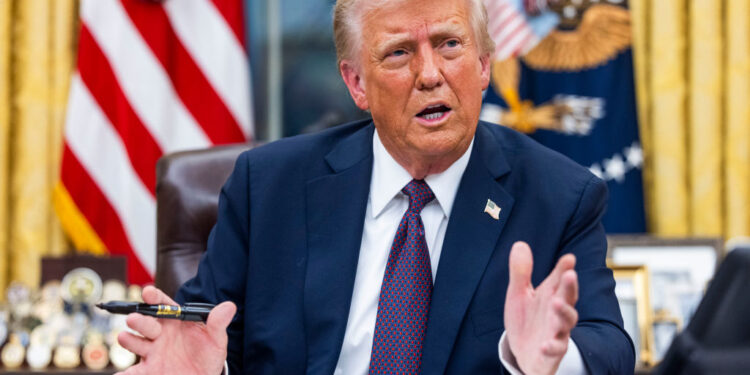 US President Donald Trump speaks while signing executive orders in the Oval Office of the White House in Washington, DC, US, on Monday, Jan. 20, 2025. President Donald Trump launched his second term with a strident inaugural address that vowed to prioritize America's interests with a "golden age" for the country, while taking on "a radical and corrupt establishment." Photographer: Jim Lo Scalzo/EPA/Bloomberg via Getty Images