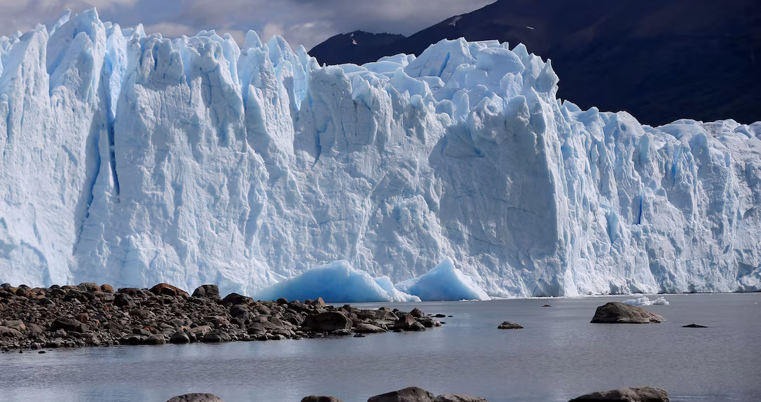 A block of ice melts in the Lago Argentino