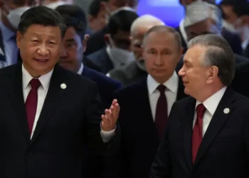 Xi Jinping, and his Russian and Uzbek counterparts, Vladimir Putin and Shavkat Mirziyoyev