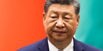 শি