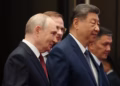 শি